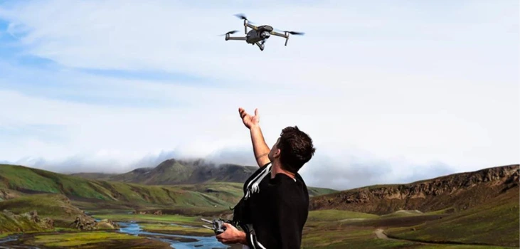 Stealth Bird 4K guy flying drone in sky